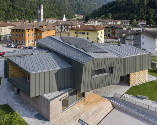 ENG group’s youth center in italian village is composed of juxtaposing superimposed volumes