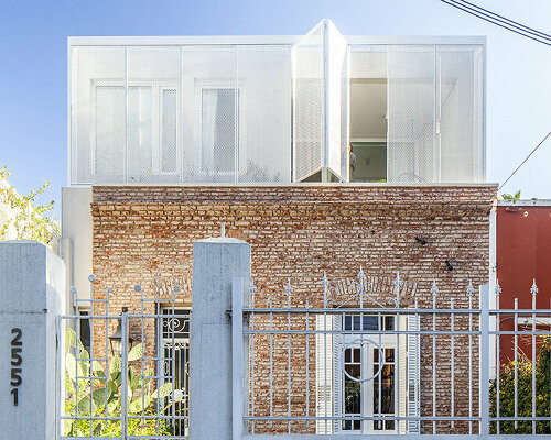 estudio PK's 'casa hormiga' restoration in buenos aires is infused with lush plant life