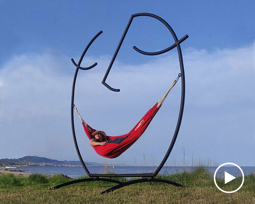 federica sala's smiling 'happy hammock' sculpture cradles the inner child