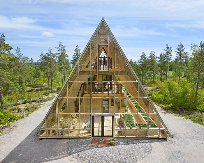 naturvillan is a self-sufficient, off-grid A-frame greenhouse home in sweden