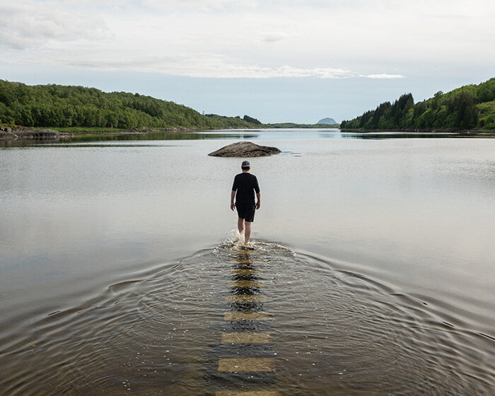 snøhetta's scenic route in norway appears and disappears with the tides