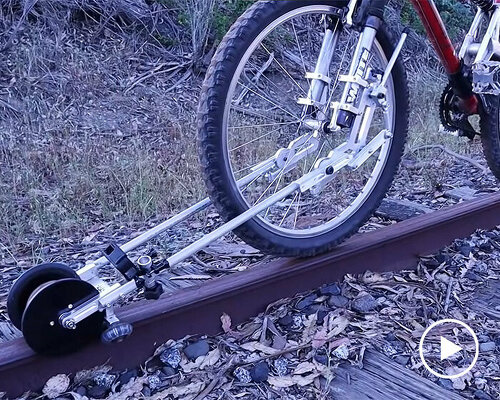 this foldable accessory transforms your bike into a draisine to ride on abandoned railways