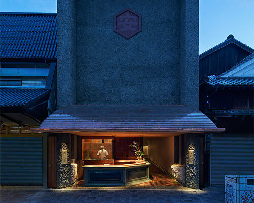 deep eaves with copper shingles protect toru shimokawa's japanese mochi shop from rain