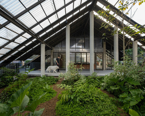 EKAR architects hybridizes a home for both humans and dogs, with lots of space for play