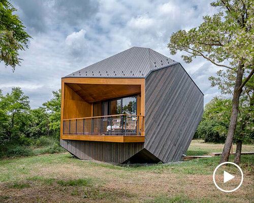 hello wood's resort weaves six boulder-like cabins into rural hungary