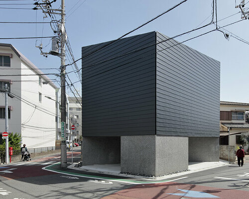 S design farm wraps pentagon-shaped house in tokyo with windowless facades