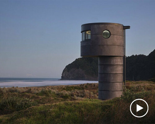 crosson architects perches robust concrete lifeguard tower along tranquil new zealand beach