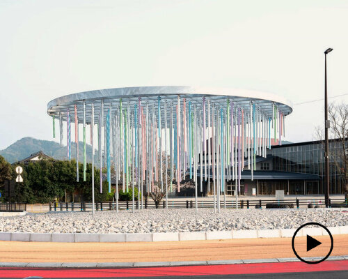 colored steel pipes drip like paint in roundabout installation by takao shiotsuka atelier