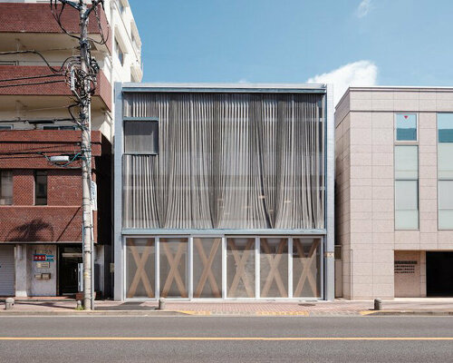 T2P architects seals the X office facade with a metallic mesh curtain in tokyo