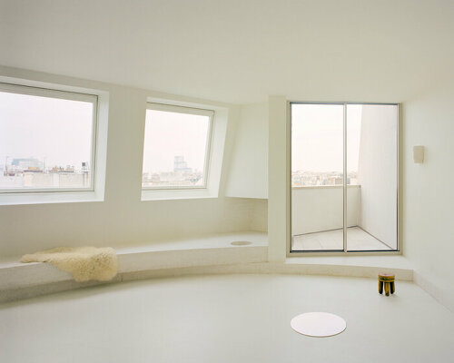 this apartment by clément lesnoff-rocard is suspended above the rooftops of paris