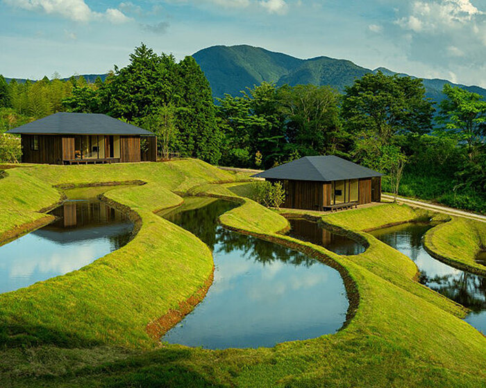 kengo kuma scatters hot spring hotel across sculpted rice terraces