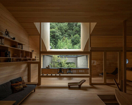 lush gardens and cave-like timber interiors characterize mega's weekend house in kyoto