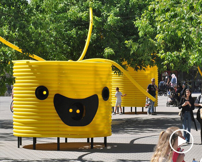 moradavaga’s giant yellow characters are acoustically interconnected in square in sweden