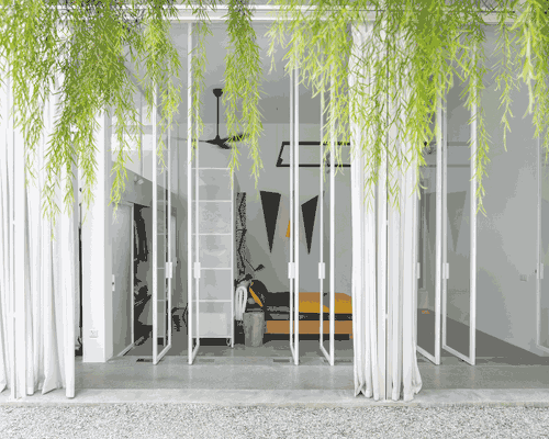 permeable spaces define 'introverse', a minimal home for an introverted architect in malaysia