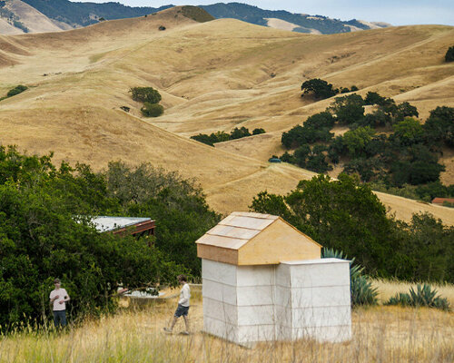 asymmetric wood installation highlights the distinct architecture of california's central valley