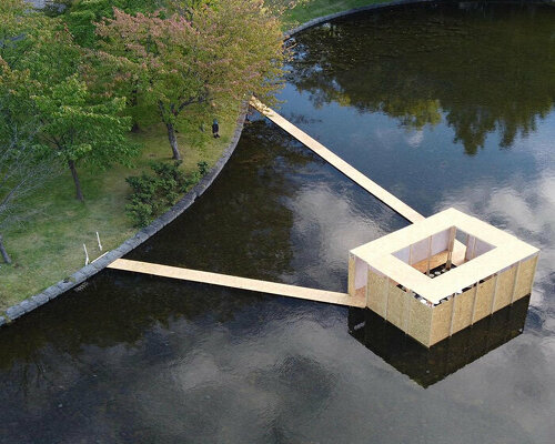 ryo yamada's floating 'infinite landscape' surrounds mirror water lilies in japanese lake