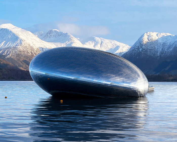 unveiled 'salmon eye' forum center floats in norway, accessible only by ferry