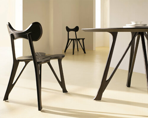 stellar works launches hand-carved chair & table set by michele de lucchi