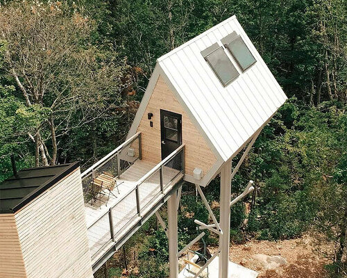 UHU micro-cabin on stilts rises from the ground to offer generous river views in canada