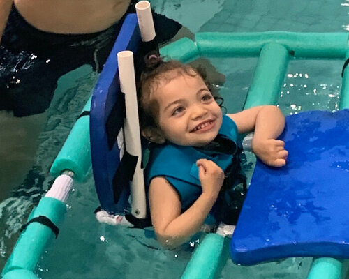 student invents pool float so kids with cerebral palsy can freely enjoy swimming