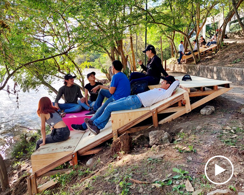 solar-panelled urban furniture made of wood offers communal spaces in colombia