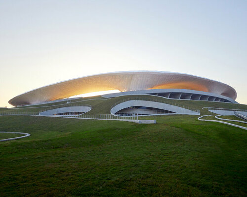 MAD architects completes sinuous stadium of its quzhou sports park