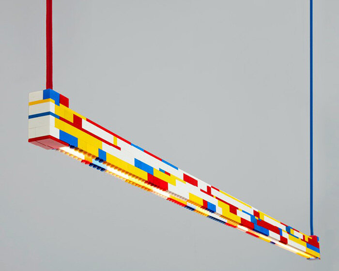 ambience studio’s repurposed LEGO brick light emanates a playful kaleidoscope of color