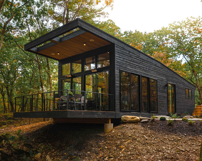 'cabana' is a cantilevered, modernist retreat perched on a forest cliff in rhinebeck, NY