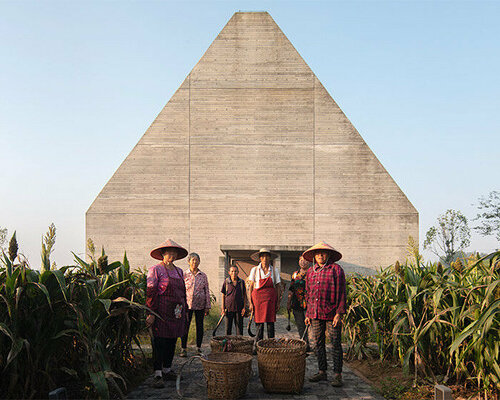 perched within a field of concentric circles, concrete barn in china connects visitors to nature