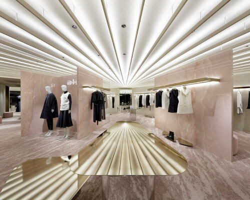 CURIOSITY injects radiant sun rays lighting & pink onyx inside m-i-d concept store, japan