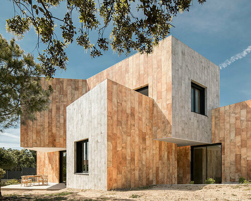 'the house of a thousand faces' by OOIIO architecture frames mountainous views in spain