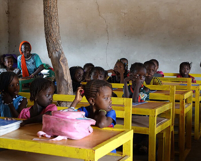 local artisans handcraft furniture for underprivileged schools in rural senegal