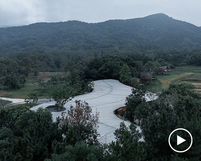 MONOARCHI tops nature community center in china with undulating aluminum roof