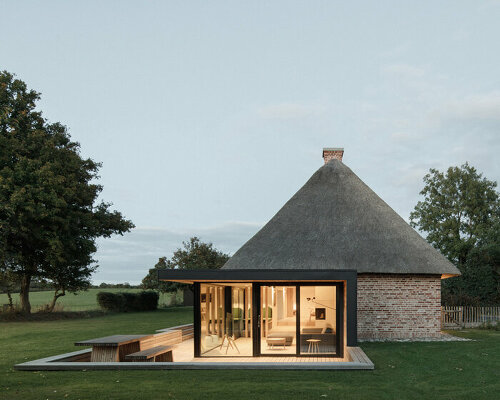 thatched brick 'nieby crofters cottage' transformed with modern glass renovation