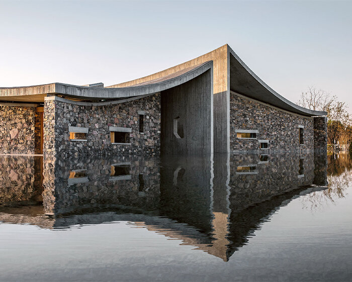 studio zhu pei tops china's OCT art center with sweeping concrete curves