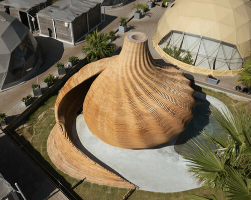 step inside kengo kuma's seashell-inspired private sauna at a japanese glamping resort