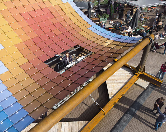 undulating ‘solar pavilion’ shelters locals and harvests sunlight at dutch design week