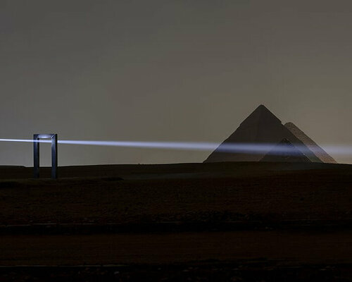 transcendent installation ‘portal of light’ illuminates ancient pyramids of giza