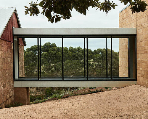 glazed walkways tie minimalistic farmhouse into rural victoria