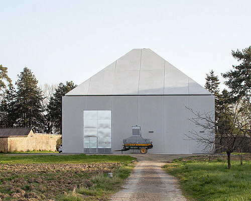 ALTA tops compact concrete 'boiler room' with pyramid roof in france