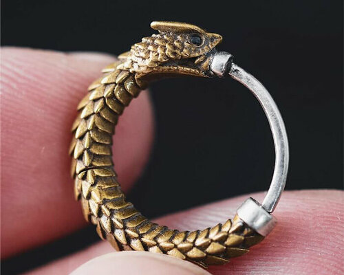 brass rattlesnake earrings by coppertist.wu embody ancient symbol of hope + eternity