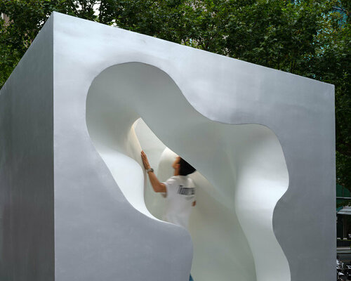 atelier ping jiang and EID arch sculpt a fluid and cavernous 'micronature' in shanghai