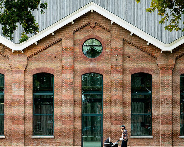 heavy gear workshop renovation exposes massive steel curtain in utrecht