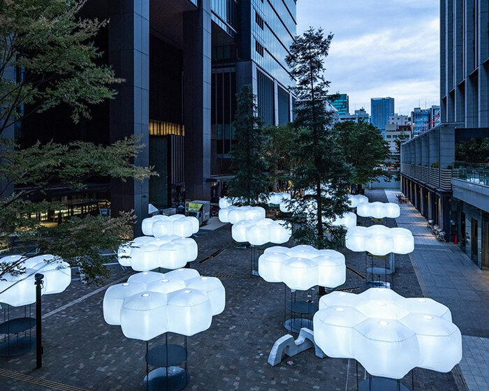 luminous rice-shaped balloons invite sake lovers to taste the brew in open-air bar in tokyo