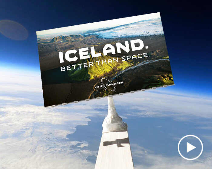 iceland's space billboard wants people to come down & visit its country instead