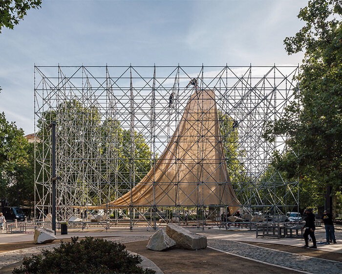 rising within a scaffold grid, P+S' AIRE pavilion creates a fragile atmosphere of air and light