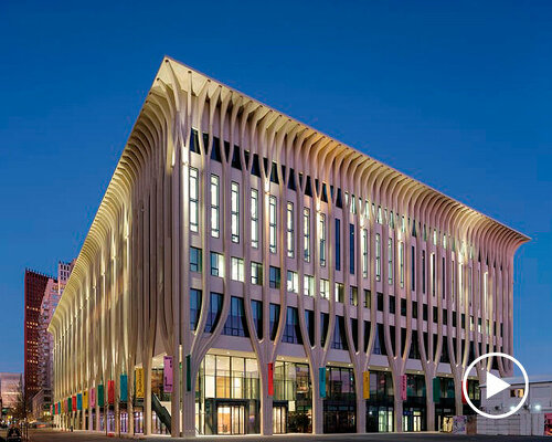 amare performance arts center forms arcade passageway between a forest of columns