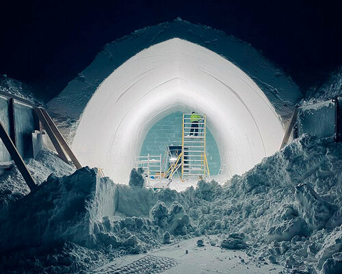 a frozen arched altar frames the new ceremony hall for the 33rd edition of ICEHOTEL