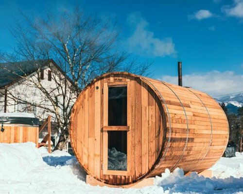 enjoy the hot steam in a 100-year-old soy sauce barrel sauna in japanese glamping resort