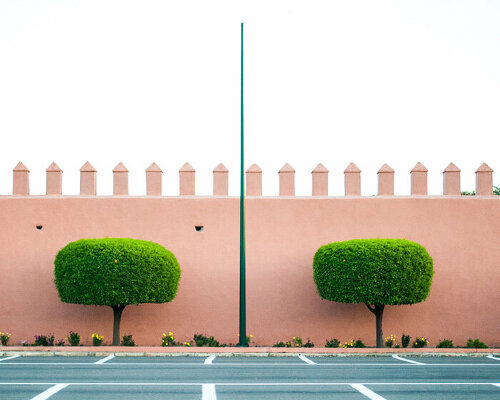 photo series captures the dusty rose hues blending morocco’s clay buildings and sandy lands